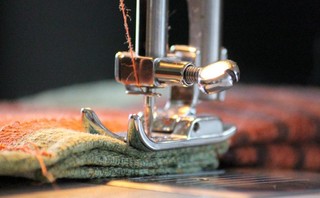 缝纫机裁剪纺织线背景图片